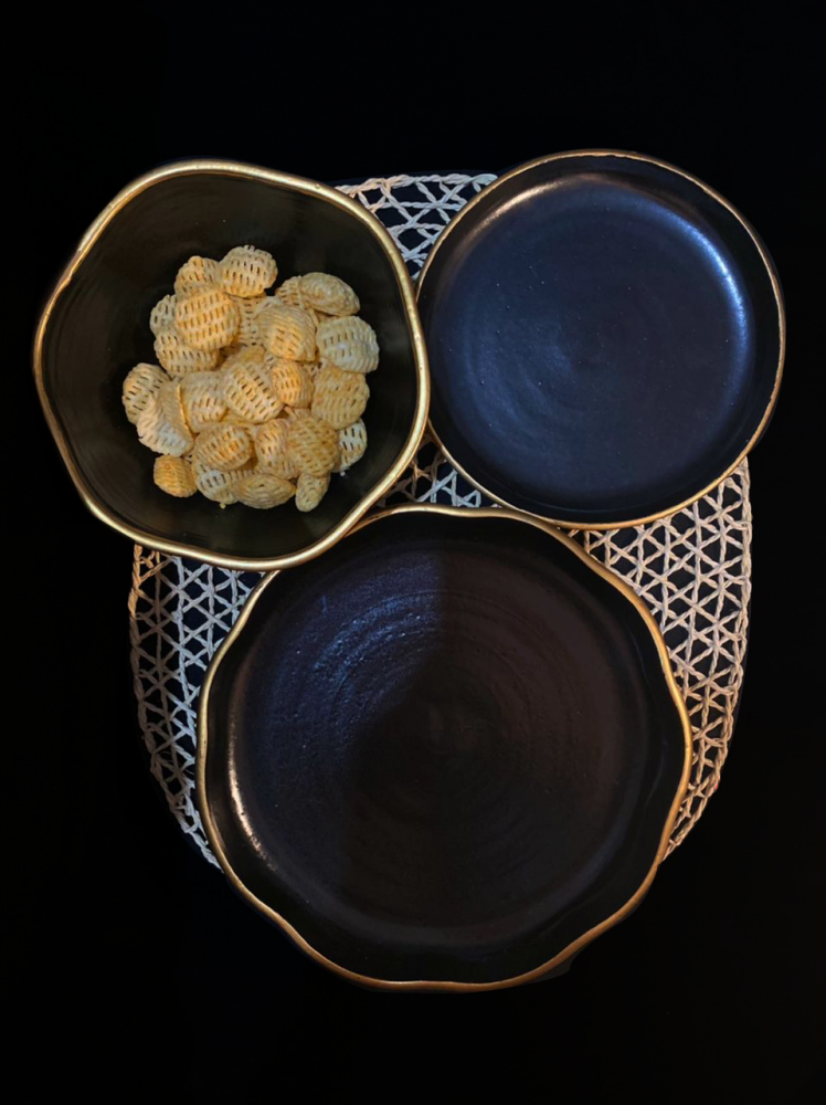 Black plate with gold edge