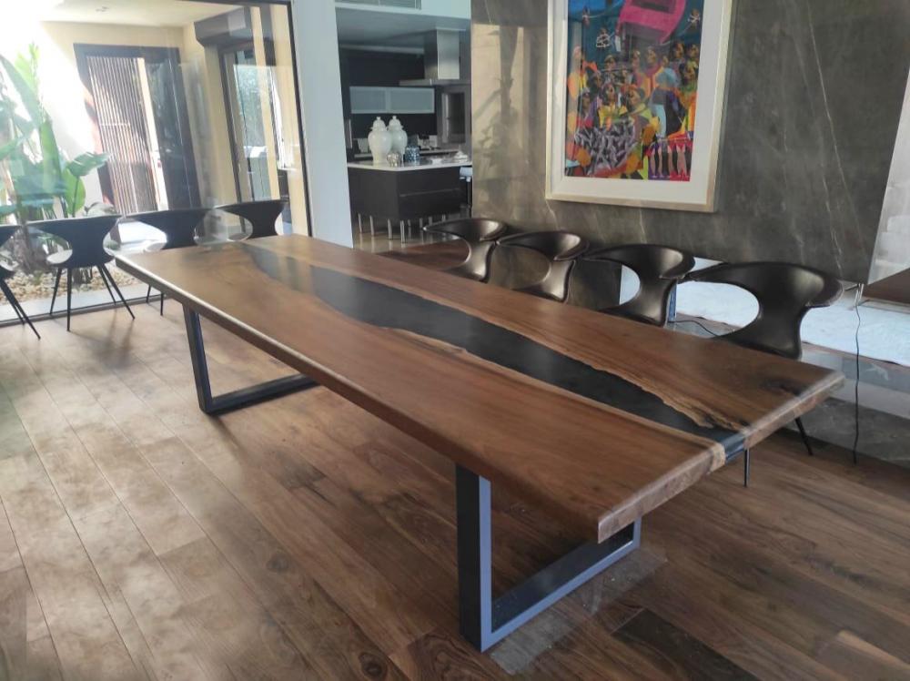 Walnut dining table with epoxy