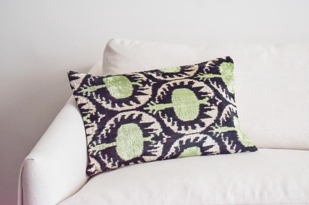 Ethnic black and green velvet Ikat cushion