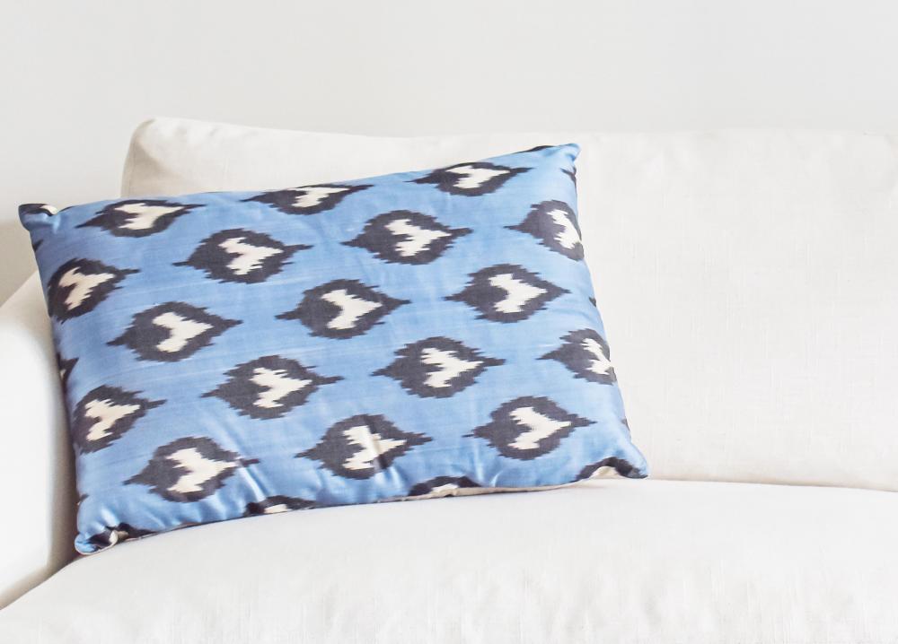 Blue feathers Ikat cushion