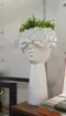 White Head Shaped Vase